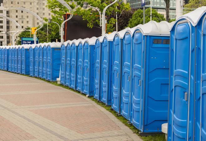 colorful portable restrooms available for rent at a local fair or carnival in Austell, GA